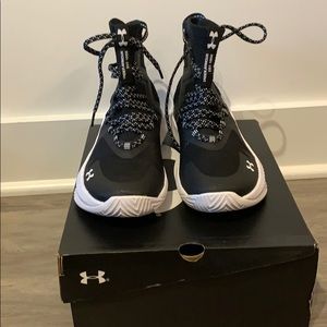 Black under armour high top volleyball shoes